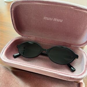 Miu Miu Black Oval Sunglasses